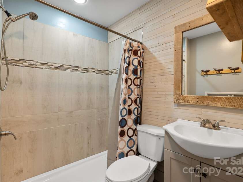 271 Breton Ridge Road, Leicester, NC 28748.  MLS# CAR4284121, YatesRealty ID 4642. Lower level Full Bath