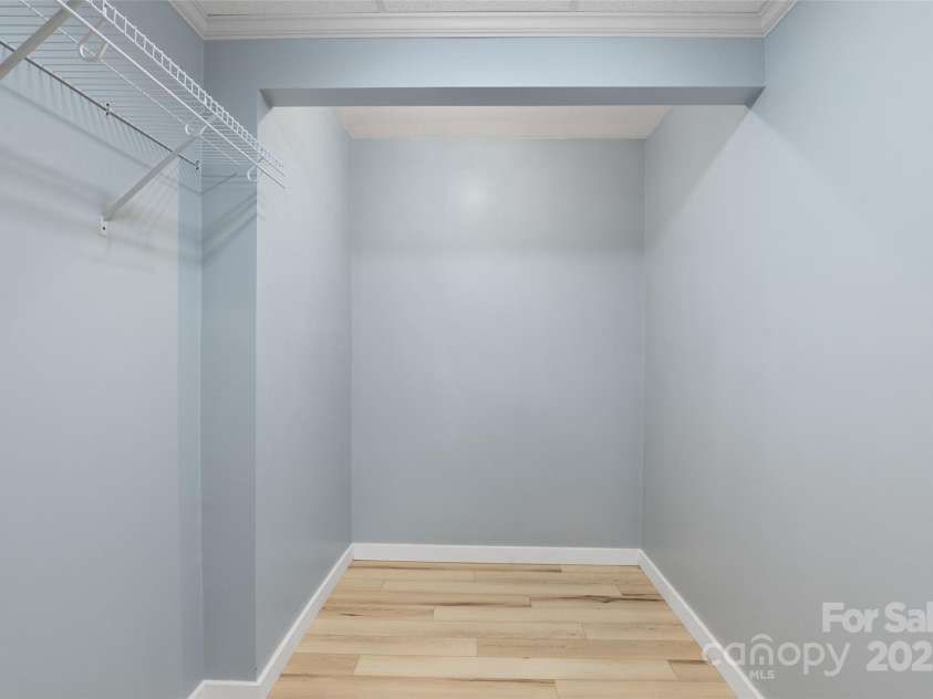 271 Breton Ridge Road, Leicester, NC 28748.  MLS# CAR4284121, YatesRealty ID 4642. Lower Level Walk In Closet