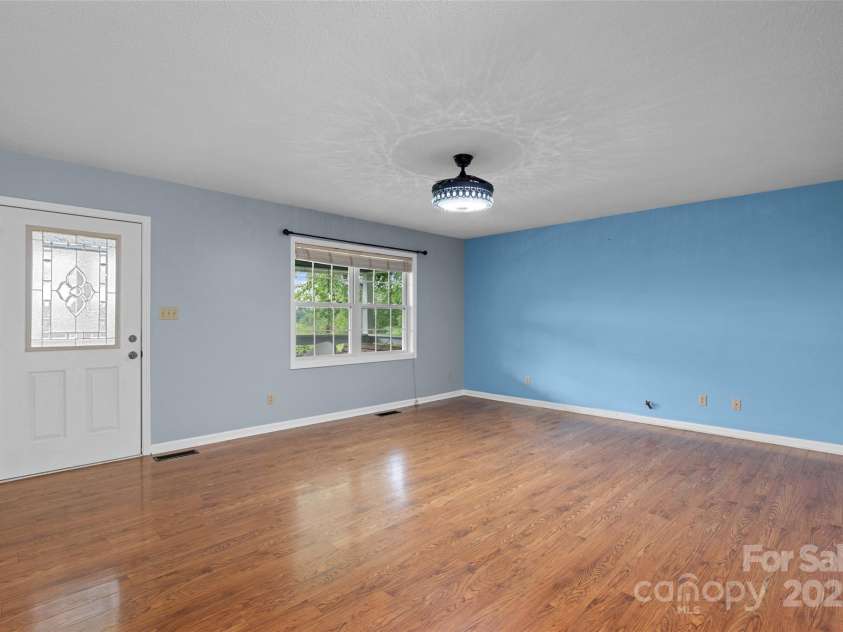 271 Breton Ridge Road, Leicester, NC 28748.  MLS# CAR4284121, YatesRealty ID 4642. Main Level Living Room