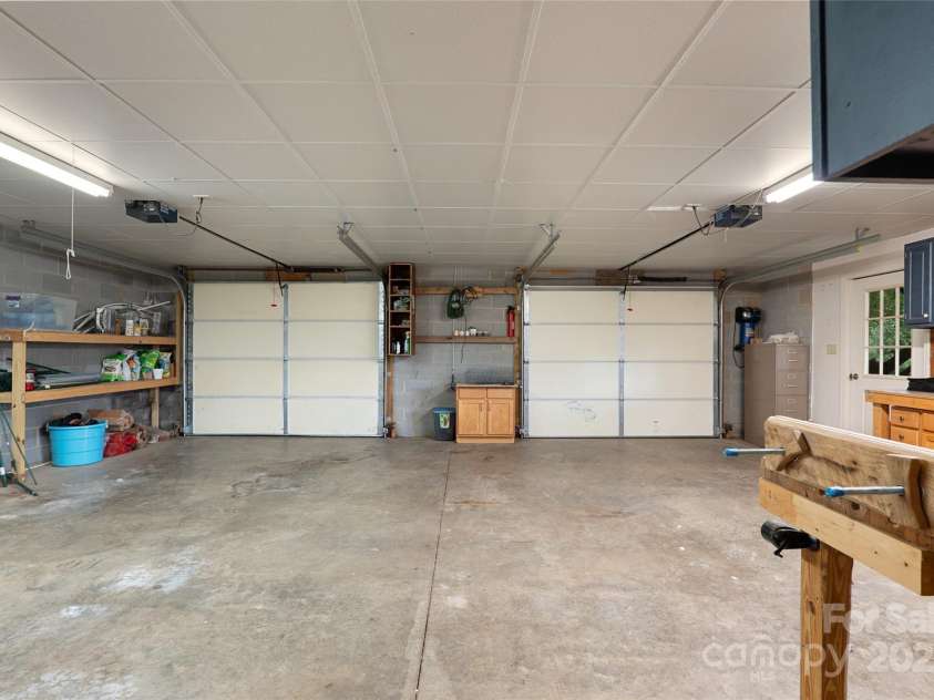 271 Breton Ridge Road, Leicester, NC 28748.  MLS# CAR4284121, YatesRealty ID 4642. Oversized 2 car garage