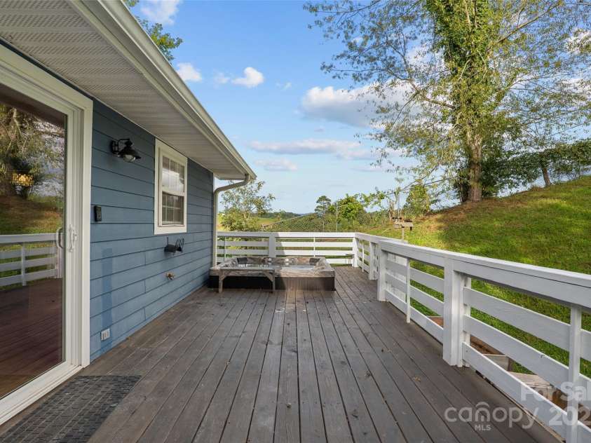 271 Breton Ridge Road, Leicester, NC 28748.  MLS# CAR4284121, YatesRealty ID 4642. Private Back Deck and Hot Tub