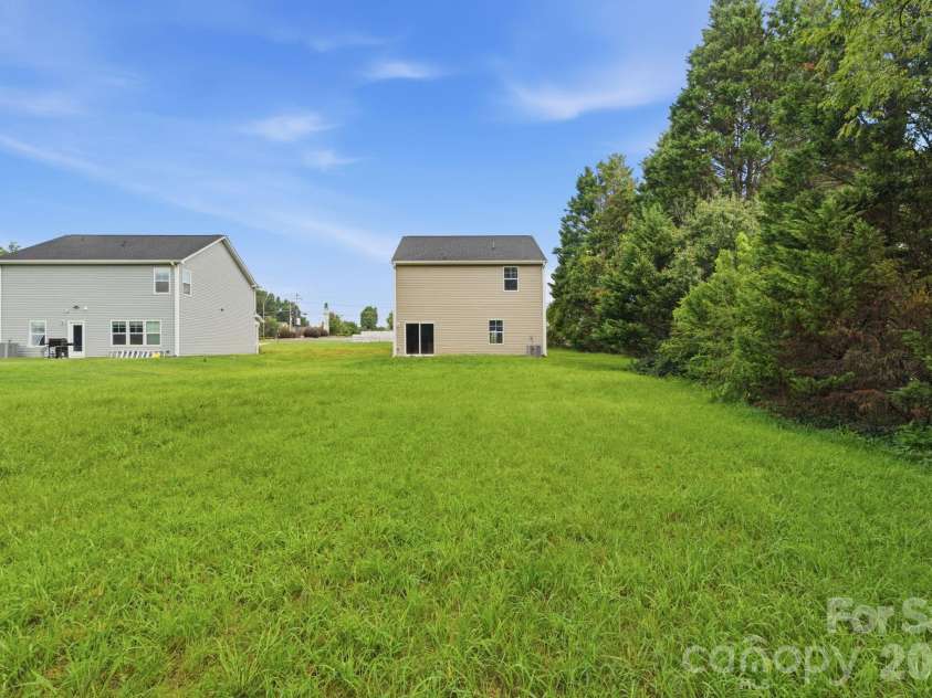 1820 Safriet Road, Statesville, NC 28677.  MLS# CAR4390167, YatesRealty ID 46421. Backyard