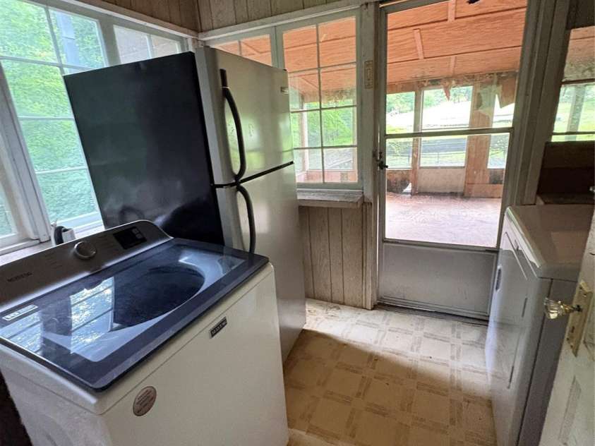 912 Halstead Boulevard, Hendersonville, NC 28791.  MLS# CAR4407762, YatesRealty ID 46423. Laundry Room Off Kitchen