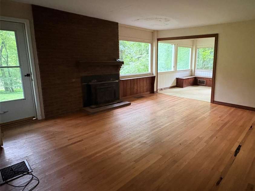 912 Halstead Boulevard, Hendersonville, NC 28791.  MLS# CAR4407762, YatesRealty ID 46423. Stone Fireplace