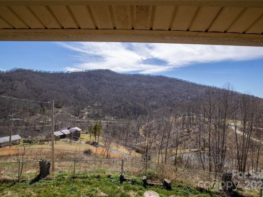 1306 Fork Mountain Road, Bakersville, NC 28705.  MLS# CAR4238711, YatesRealty ID 4643. 