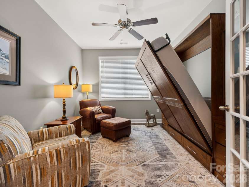78 Fox Cove Road, Hendersonville, NC 28792.  MLS# CAR4415476, YatesRealty ID 46435. Den with Murphy Bed