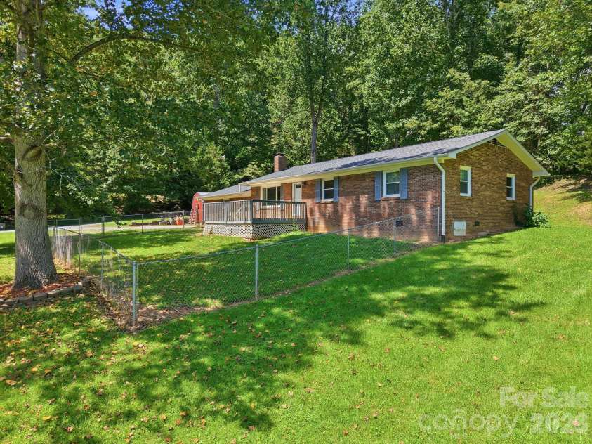 339 Indian Hills Loop, Waynesville, NC 28786.  MLS# CAR4417472, YatesRealty ID 46453. Front of house angle