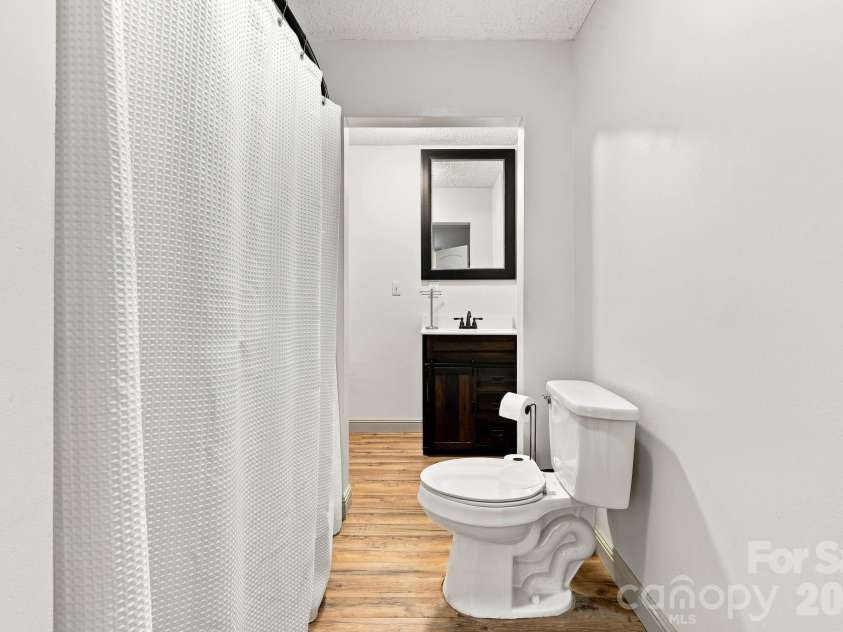 339 Indian Hills Loop, Waynesville, NC 28786.  MLS# CAR4417472, YatesRealty ID 46453. Guest Bath