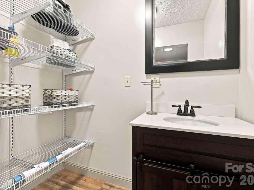 339 Indian Hills Loop, Waynesville, NC 28786.  MLS# CAR4417472, YatesRealty ID 46453. Guest Bath