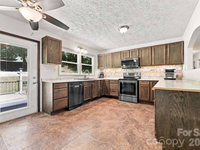 339 Indian Hills Loop, Waynesville, NC 28786.  MLS# CAR4417472, YatesRealty ID 46453. Kitchen 2