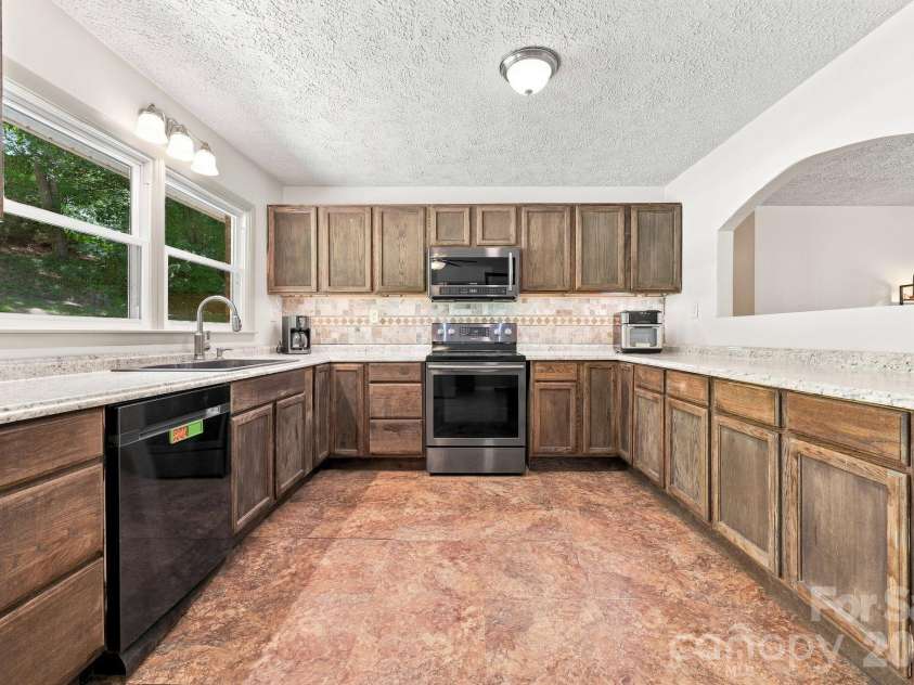339 Indian Hills Loop, Waynesville, NC 28786.  MLS# CAR4417472, YatesRealty ID 46453. Kitchen 3