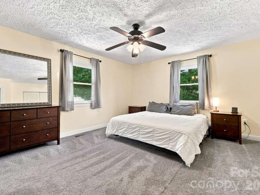 339 Indian Hills Loop, Waynesville, NC 28786.  MLS# CAR4417472, YatesRealty ID 46453. Primary bedroom 1