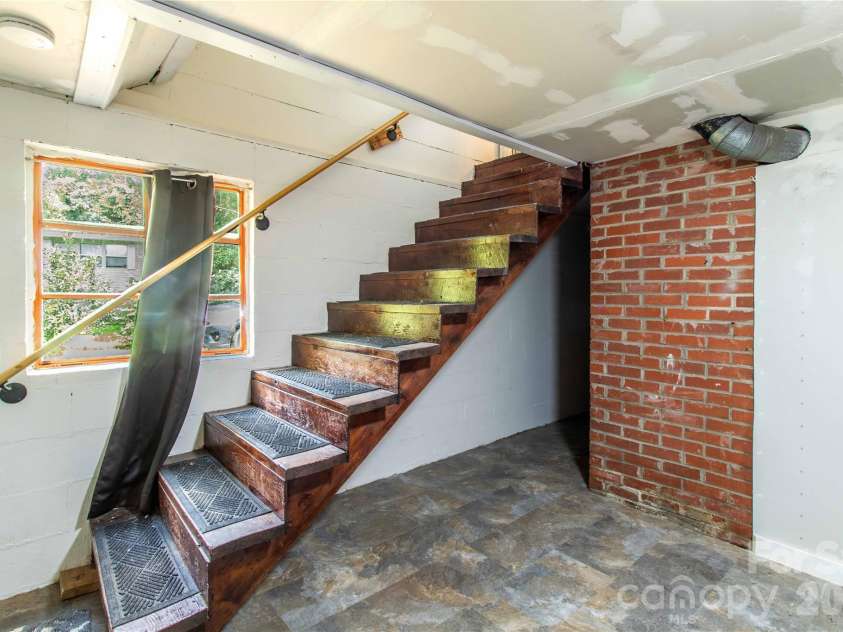875 Mills Gap Road, Fletcher, NC 28732.  MLS# CAR4416274, YatesRealty ID 46461. 
