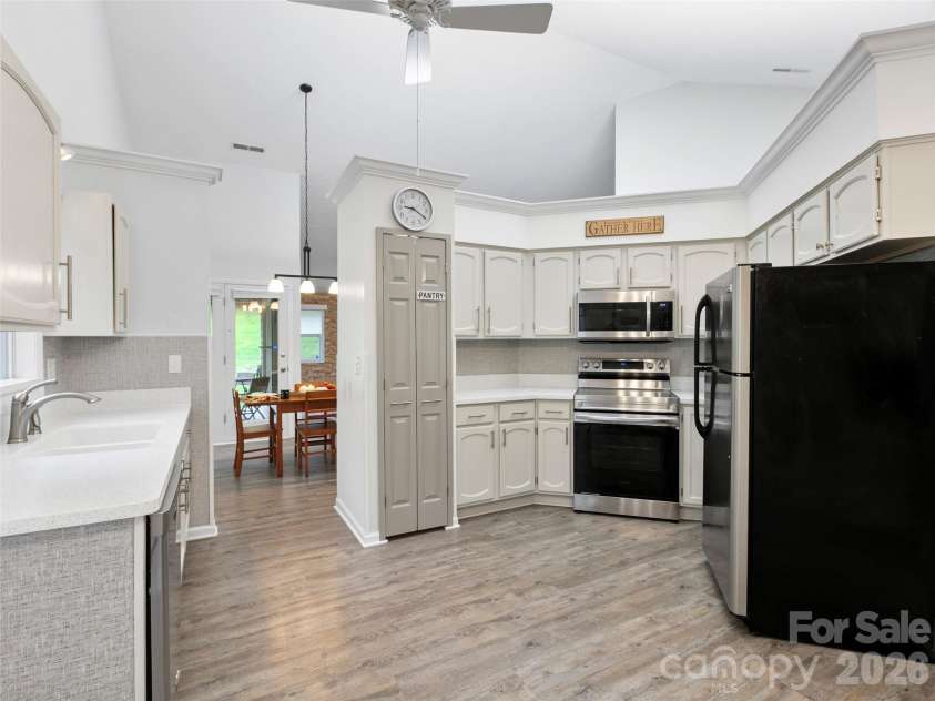 4 Tisha Lane, Hendersonville, NC 28739.  MLS# CAR4416809, YatesRealty ID 46470. Kitchen to Dining