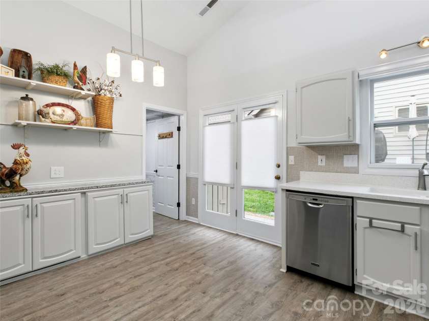 4 Tisha Lane, Hendersonville, NC 28739.  MLS# CAR4416809, YatesRealty ID 46470. Kitchen to  side exterior