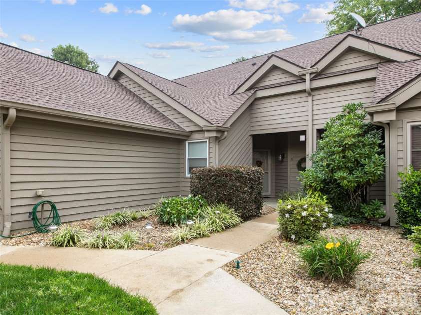 4 Tisha Lane, Hendersonville, NC 28739.  MLS# CAR4416809, YatesRealty ID 46470. Landscaped front