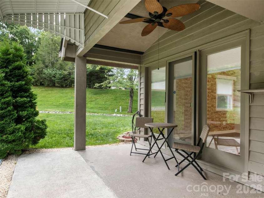 4 Tisha Lane, Hendersonville, NC 28739.  MLS# CAR4416809, YatesRealty ID 46470. Side patio