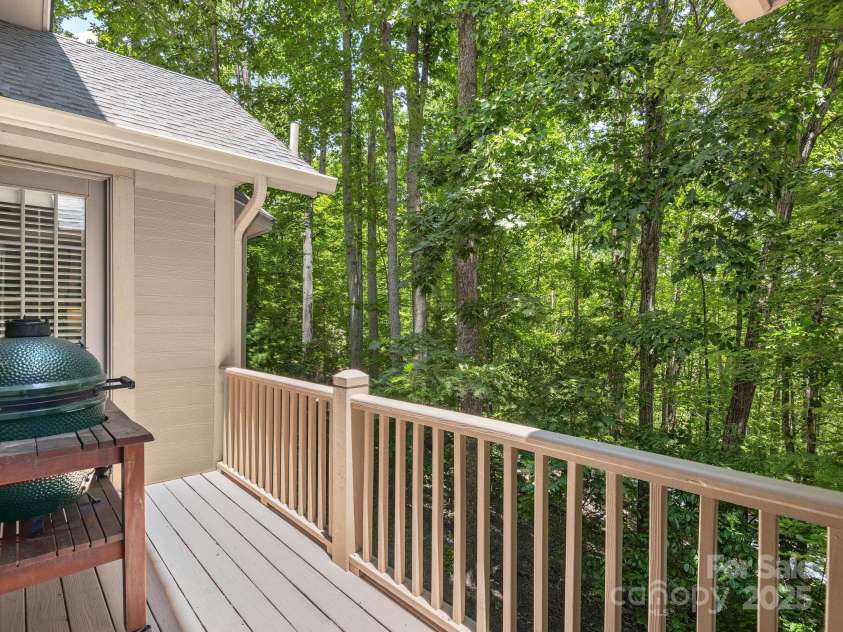 202 Bent Pine Trace, Hendersonville, NC 28739.  MLS# CAR4308602, YatesRealty ID 4648. Grilling Back Porch