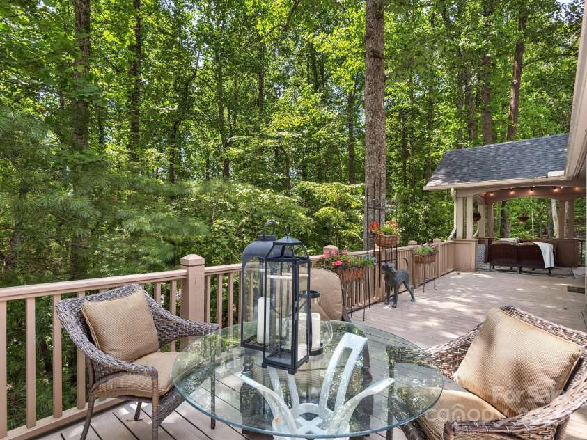 202 Bent Pine Trace, Hendersonville, NC 28739.  MLS# CAR4308602, YatesRealty ID 4648. Wrap Around Porch