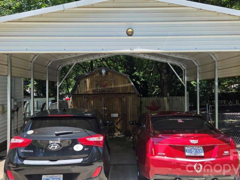 809 Alexander Street, Lincolnton, NC 28092.  MLS# CAR4395562, YatesRealty ID 46489. Carport