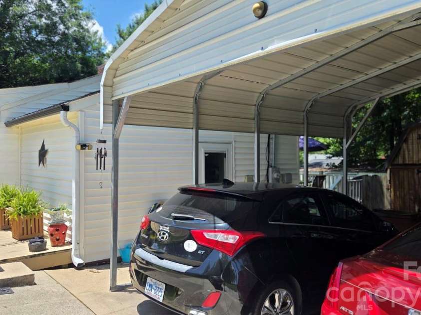 809 Alexander Street, Lincolnton, NC 28092.  MLS# CAR4395562, YatesRealty ID 46489. Carport