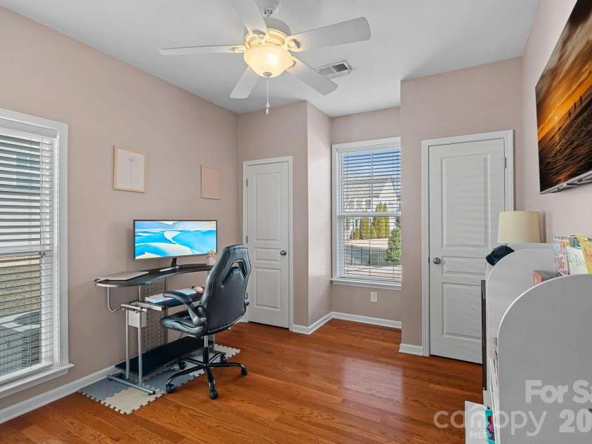 135 Rainberry Drive, Mooresville, NC 28117.  MLS# CAR4345698, YatesRealty ID 4649. Main-level guest bedroom or office with private full bath.