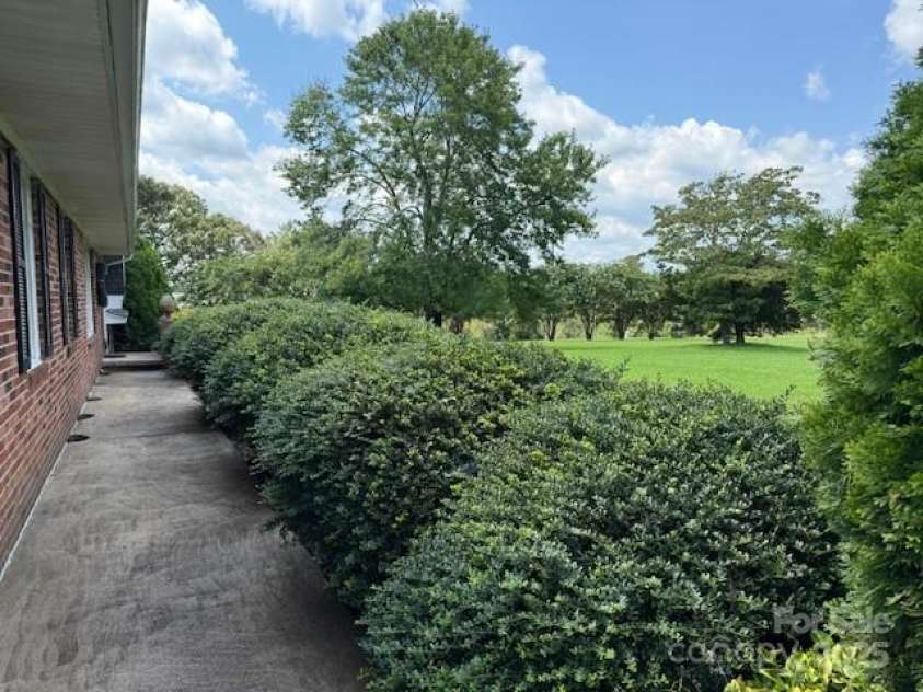 3319 Humphries Road, Shelby, NC 28150.  MLS# CAR4293516, YatesRealty ID 4649. Front Sidewalk