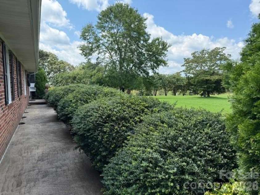 3319 Humphries Road, Shelby, NC 28150.  MLS# CAR4293516, YatesRealty ID 4649. Front Sidewalk