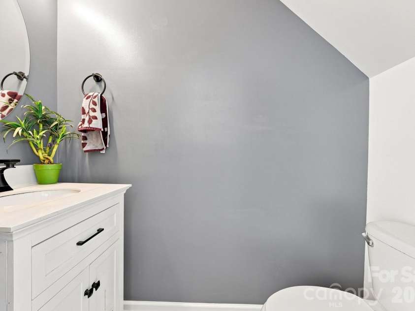 149 Leyton Loop, Mooresville, NC 28117.  MLS# CAR4416765, YatesRealty ID 46491. Half bathroom downstairs