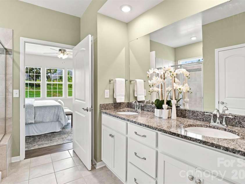 3065 Rosseau Lane, Mount Holly, NC 28120.  MLS# CAR4417646, YatesRealty ID 46493. Primary bath