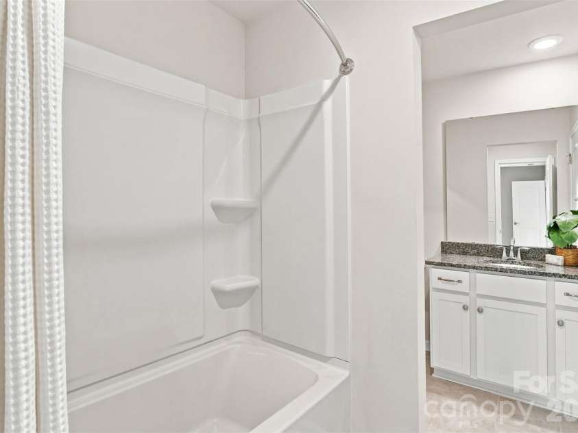 3065 Rosseau Lane, Mount Holly, NC 28120.  MLS# CAR4417646, YatesRealty ID 46493. Upstairs bath