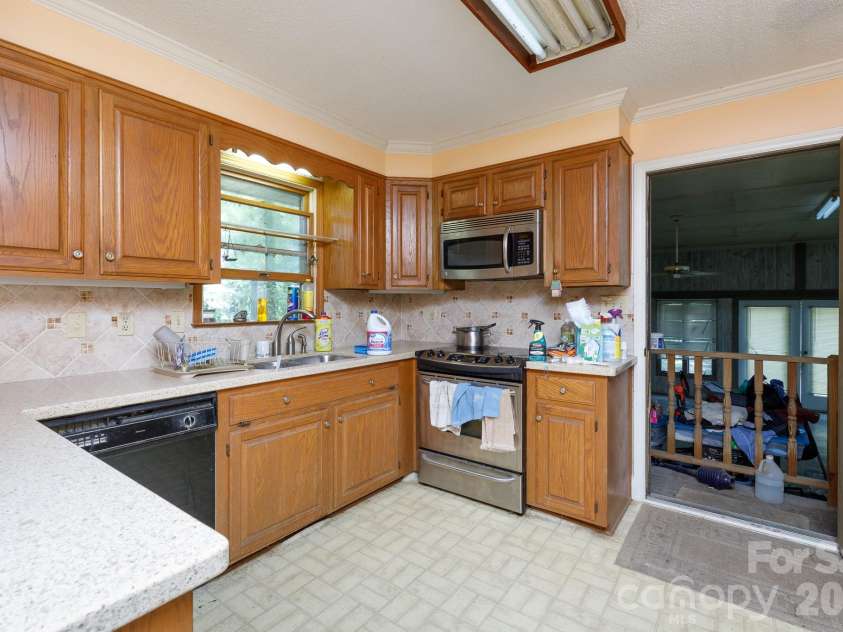 3550 Tree Line Drive, Rock Hill, SC 29732.  MLS# CAR4417396, YatesRealty ID 46503. Kitchen door leads to Bonus Room