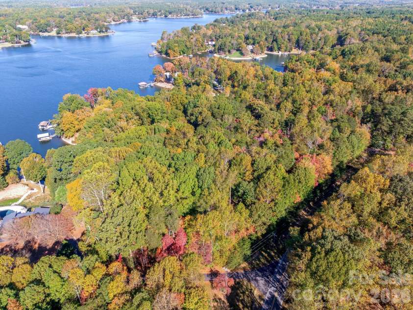 1168 Fern Hill Road, Mooresville, NC 28117.  MLS# CAR4351598, YatesRealty ID 4651. Views of edge of property showing Fern Hill on the right and Fairburn in the front