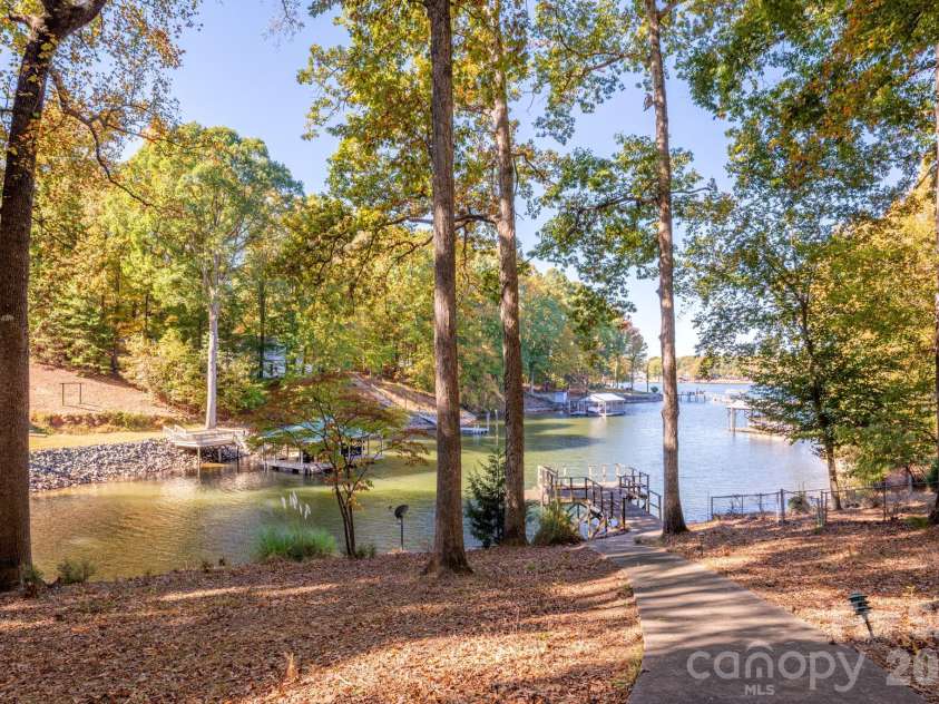 1168 Fern Hill Road, Mooresville, NC 28117.  MLS# CAR4351598, YatesRealty ID 4651. Views of lake from current home on Bridlewood