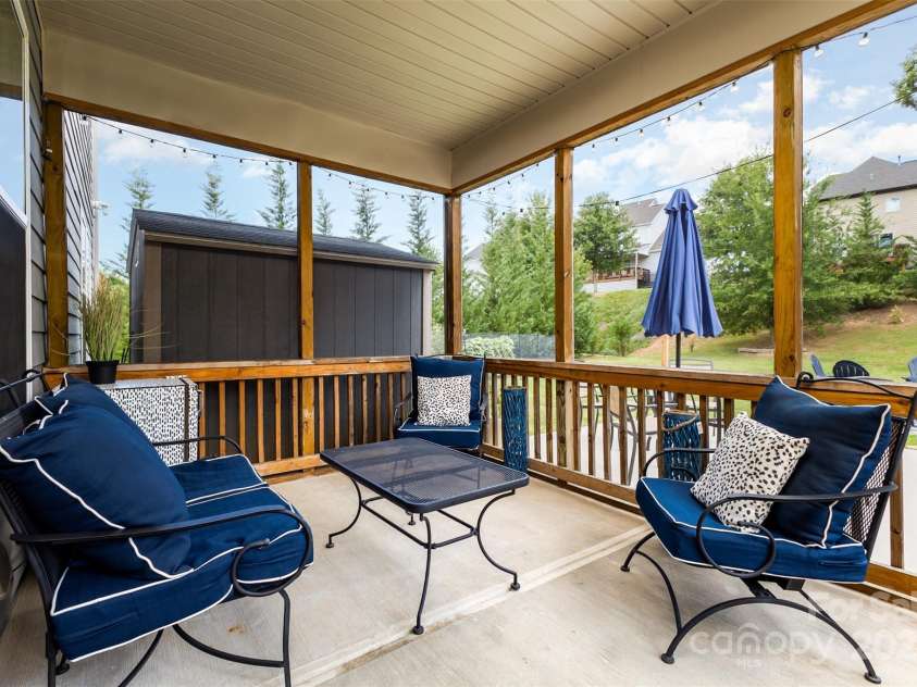8651 Shadetree Street, Huntersville, NC 28078.  MLS# CAR4284717, YatesRealty ID 4653. Screened in porch