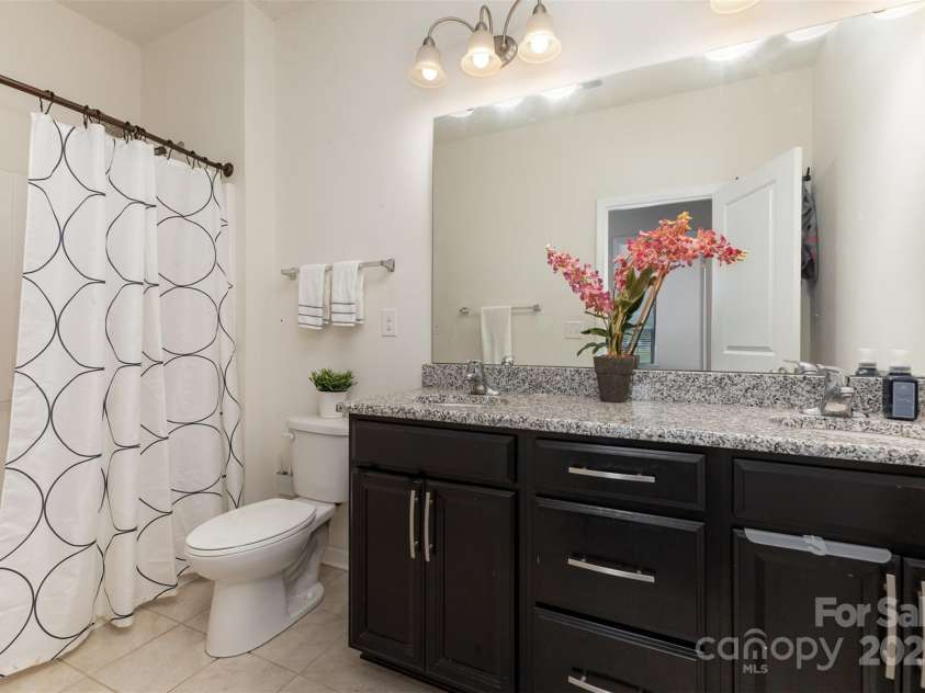 8651 Shadetree Street, Huntersville, NC 28078.  MLS# CAR4284717, YatesRealty ID 4653. Upstairs bathroom