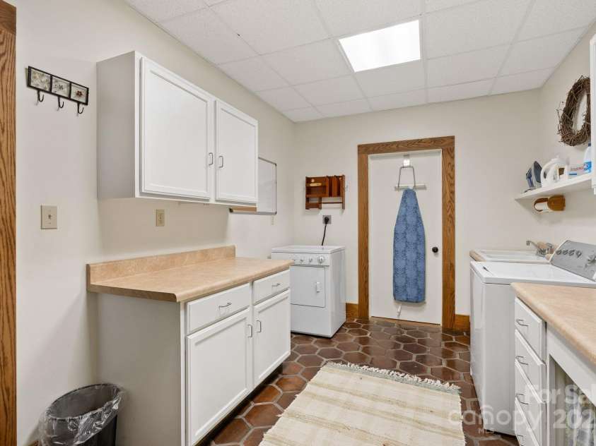 111 Flora Rose Trail, Asheville, NC 28803.  MLS# CAR4239614, YatesRealty ID 4654. Laundry