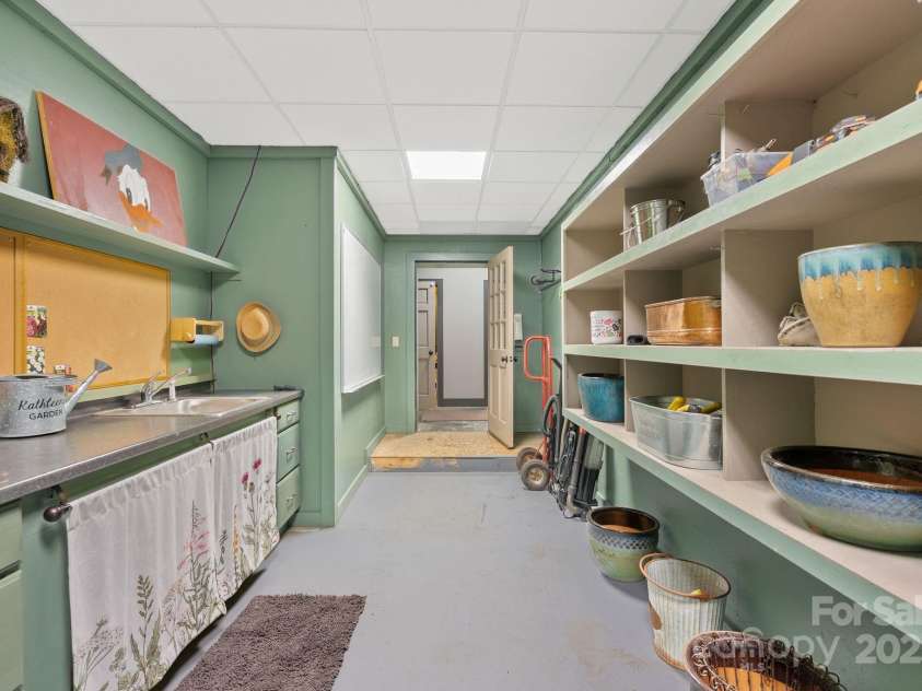 111 Flora Rose Trail, Asheville, NC 28803.  MLS# CAR4239614, YatesRealty ID 4654. Potting room