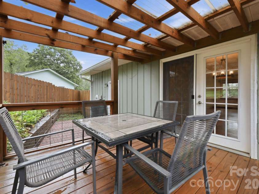 62 Hunters Field Lane, Mills River, NC 28759.  MLS# CAR4407487, YatesRealty ID 46548. Back patio