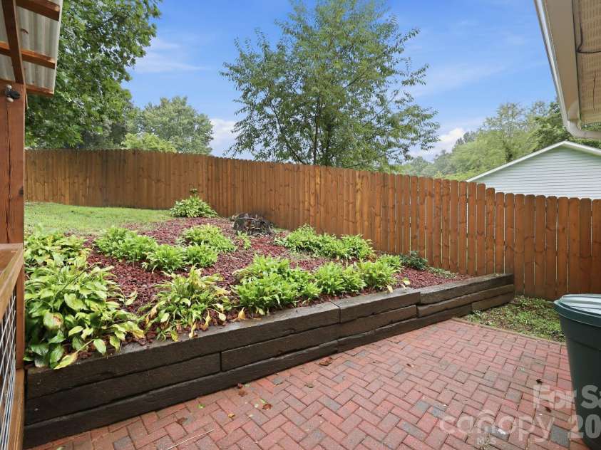 62 Hunters Field Lane, Mills River, NC 28759.  MLS# CAR4407487, YatesRealty ID 46548. Fenced back yard