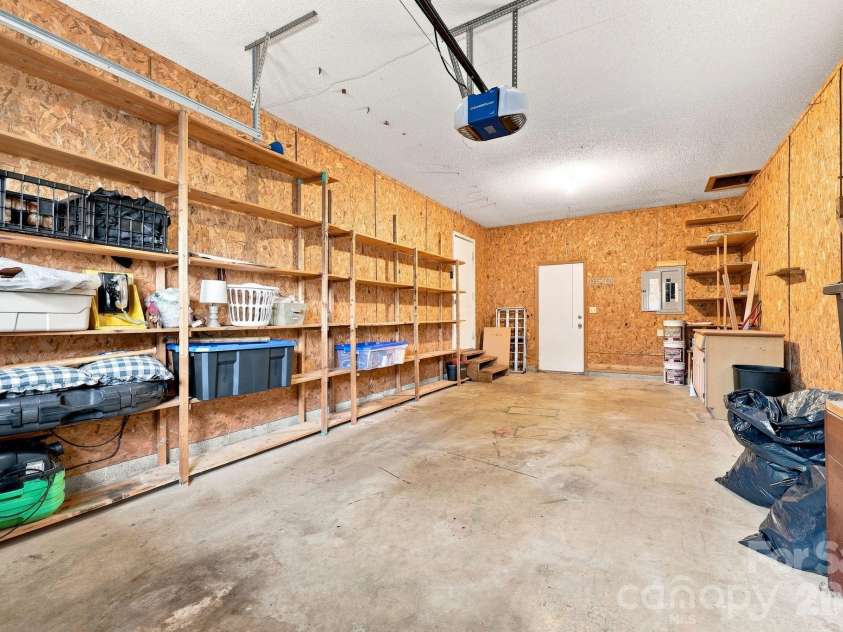62 Hunters Field Lane, Mills River, NC 28759.  MLS# CAR4407487, YatesRealty ID 46548. Oversized one car garage
