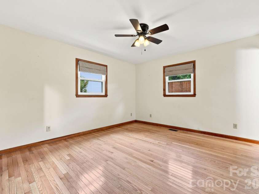 62 Hunters Field Lane, Mills River, NC 28759.  MLS# CAR4407487, YatesRealty ID 46548. Primary bedroom