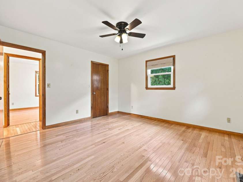 62 Hunters Field Lane, Mills River, NC 28759.  MLS# CAR4407487, YatesRealty ID 46548. Primary bedroom