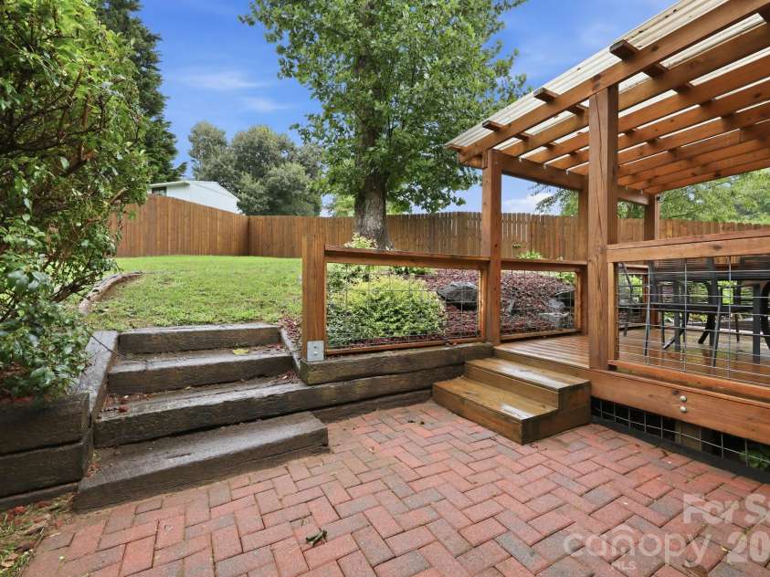 62 Hunters Field Lane, Mills River, NC 28759.  MLS# CAR4407487, YatesRealty ID 46548. Private back yard oasis