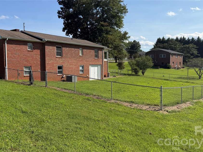 2372 Jamestown Road, Morganton, NC 28655.  MLS# CAR4417833, YatesRealty ID 46552. Back view with fenced yard