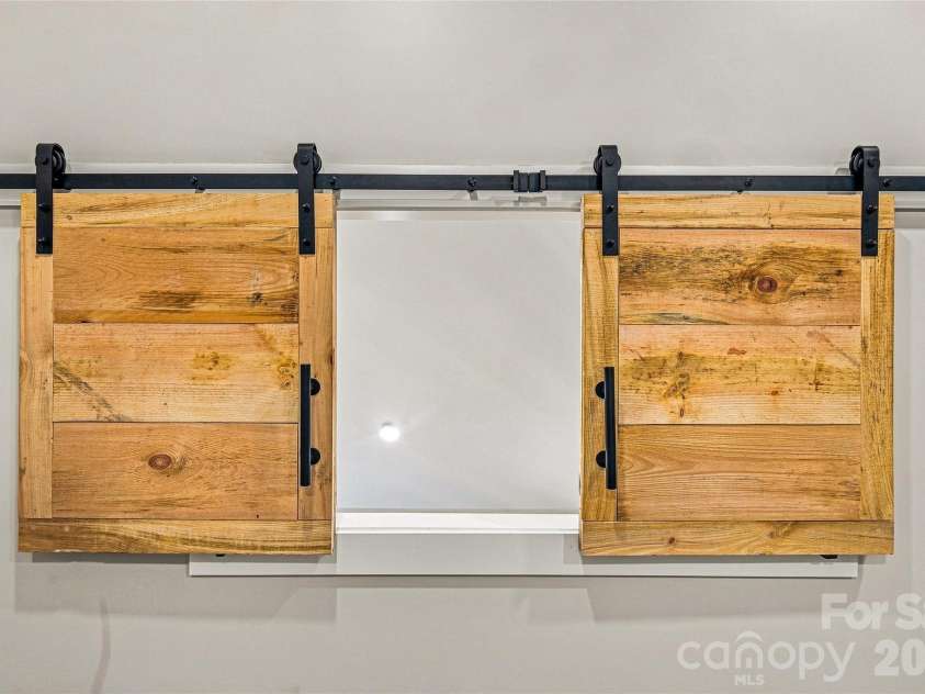 87 Catatoga Trail, Marion, NC 83452.  MLS# CAR4403584, YatesRealty ID 46554. Custom sliding barn doors