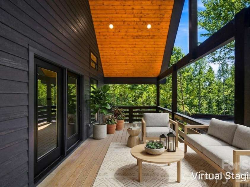 87 Catatoga Trail, Marion, NC 83452.  MLS# CAR4403584, YatesRealty ID 46554. Expansive deck for outdoor living– virtually staged