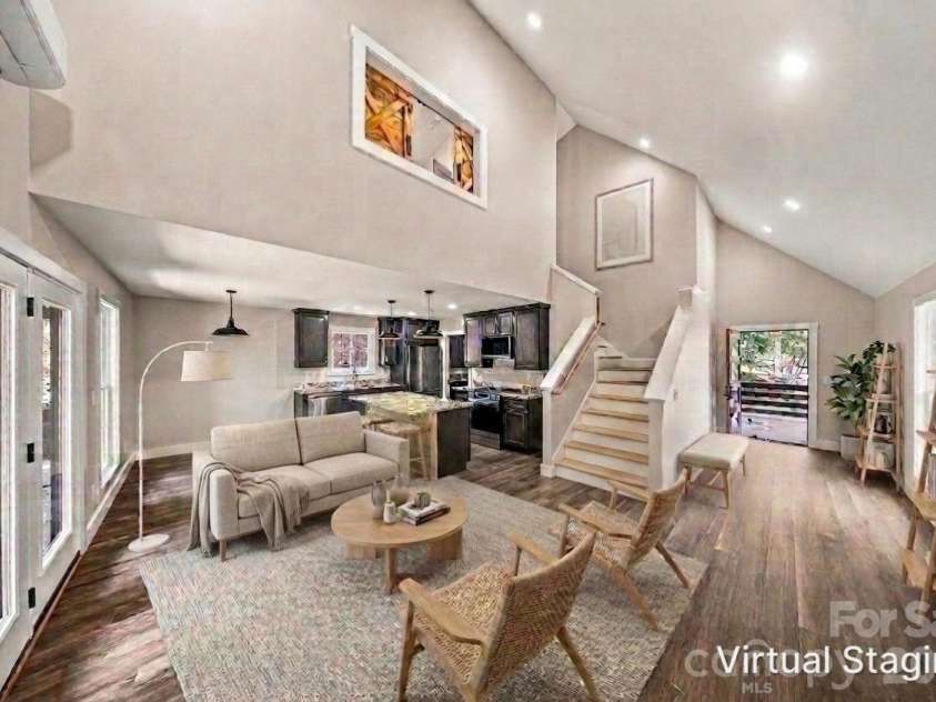 87 Catatoga Trail, Marion, NC 83452.  MLS# CAR4403584, YatesRealty ID 46554. Expansive deck for outdoor living– virtually staged
