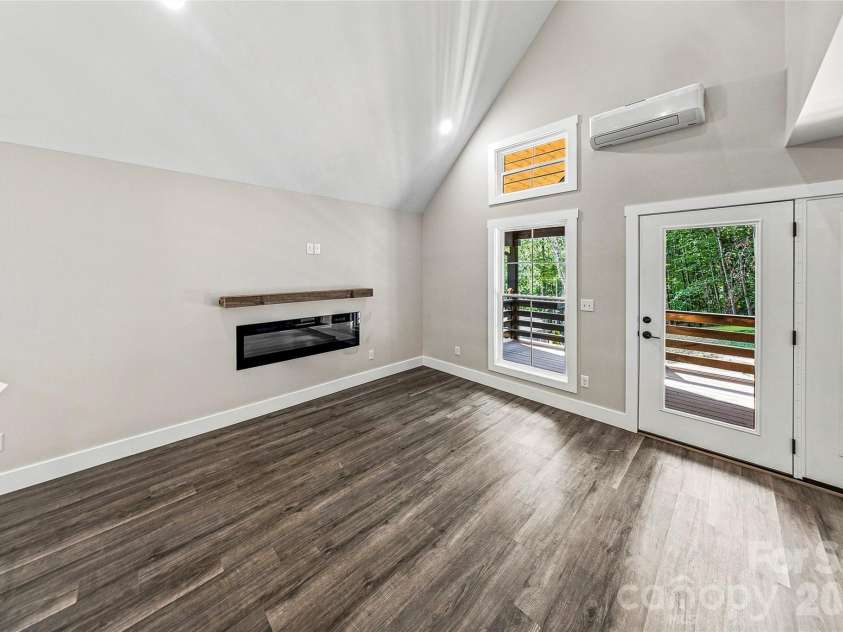 87 Catatoga Trail, Marion, NC 83452.  MLS# CAR4403584, YatesRealty ID 46554. Great room with vaulted ceiling