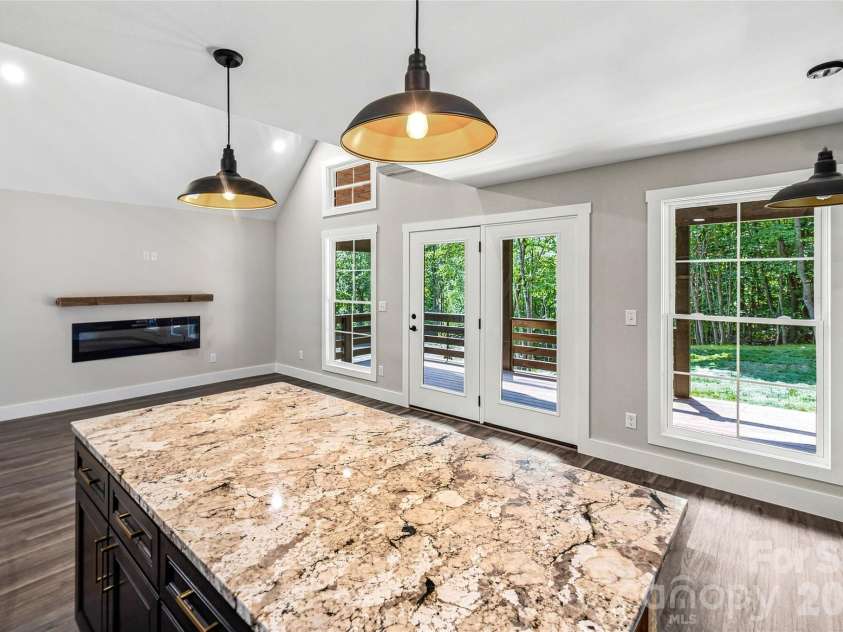 87 Catatoga Trail, Marion, NC 83452.  MLS# CAR4403584, YatesRealty ID 46554. Kitchen opens to great room